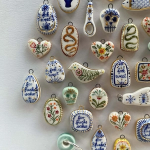 Artistic hand-painted ceramic skull and heart charms with 18K gold plated loops