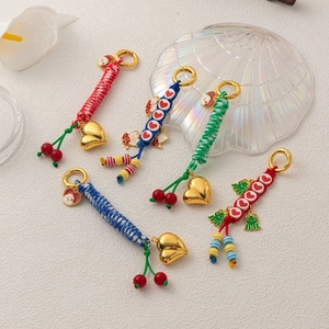 DIY colorful woven keychains with 18K gold heart charms and cute cartoon pendants