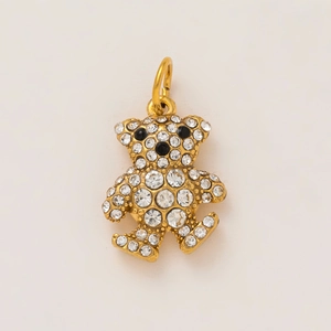 Detailed view of 3D bear pendant in 18K gold plating with sparkling white crystals