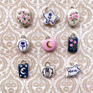9-piece set of handmade ceramic pendants with floral rose and moon patterns plated in 18K gold