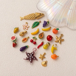 Set di ciondoli placcati oro 18K con frutti e creature marine per creazione gioielli