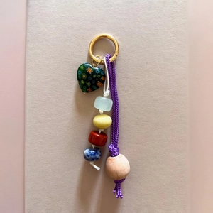 Elegant beaded bag charm with vintage floral heart glass bead and colorful rope link