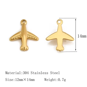 Macro detail of 18K gold-plated stainless steel airplane pendant with 3D wings