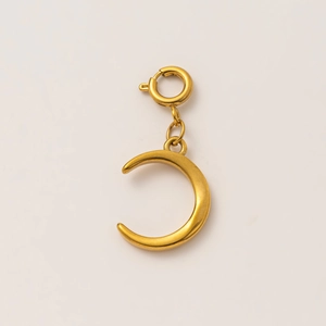 Detail of 18K gold-plated moon-shaped pendant with a spring clasp for jewelry making