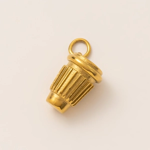 Macro shot of 18K gold-plated stainless steel coffee cup pendant with vertical stripes
