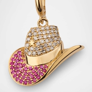 Macro detail of 18k gold cowboy hat pendant with sparkling pink and white crystals