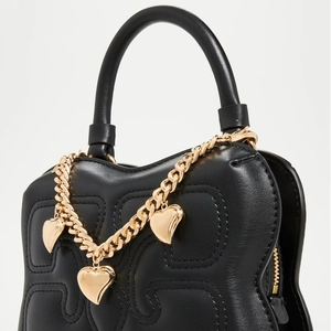 Elegant black embossed leather handbag with gold chain strap and heart pendants