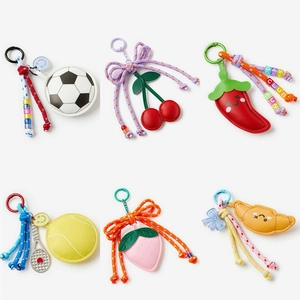 Creative faux leather keychain charms with football, cherry, chili and croissant designs