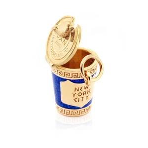 Macro detail of a 3D New York coffee cup charm with gold finish and blue enamel