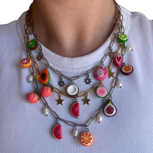 Layered stainless steel necklace with colorful fruit pendants, pearls and star charms