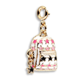 Detail of backpack-shaped charm with star patterns and a golden spring ring clasp