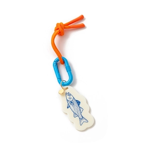 Detail of nautical keychain with orange woven rope, blue carabiner, and fish pendant