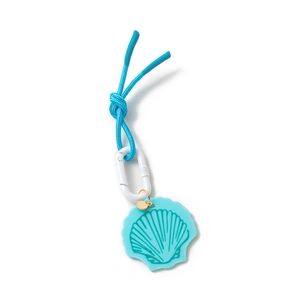 Detail view of a light blue shell charm with silicone texture and white carabiner hook