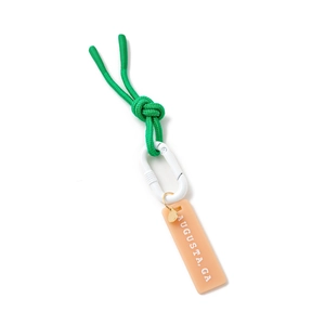 Detail of green woven cord keychain with white carabiner and pink Augusta text tag