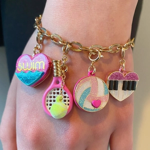 Fashionable gold charm bracelet with swim, tennis, volleyball and piano heart pendants