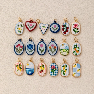 Set of 18 colorful enamel charms with floral and fruit motifs for DIY jewelry making