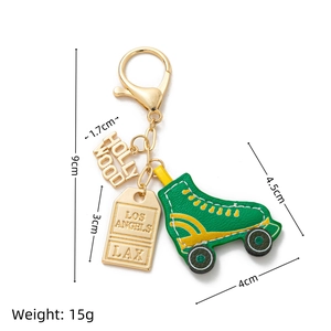 Detail showing dimensions of roller skate keychain with Hollywood and LAX charms