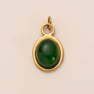 Close-up of 18K gold plated oval pendant with polished green agate stone inlay