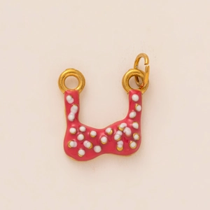 Détail du pendentif bikini à pois rouges et blancs en acier inoxydable doré pour bijoux
