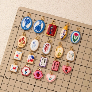 Set de dijes de cerámica vintage con diseños de langosta y flores doradas para joyería DIY