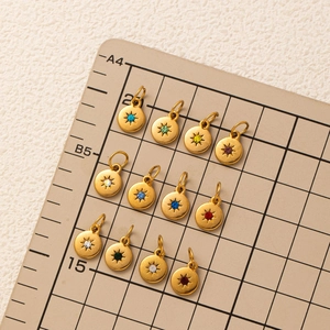 18K gold plated stainless steel starburst charms with colorful birthstones on grid