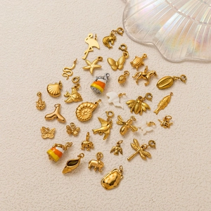 Collection de pendentifs en acier inoxydable doré 18K avec motifs papillon et coquillage