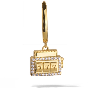 Gold stainless steel huggie earrings featuring a 777 slot machine pendant with white crystals