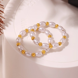 Set di anelli impilabili con perle e perline dorate per donna dal design elasticizzato