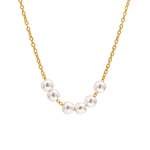Elegante collana d'oro con sei perle bianche a forma di U su sfondo bianco