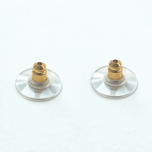Detailed view of 18K gold plated brass ear backings with stable silicone disc support