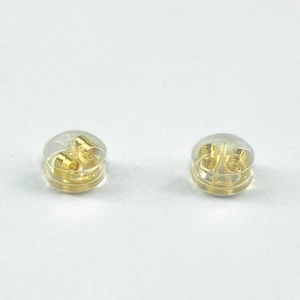 Detail showing 18K gold plated butterfly earring backs with transparent silicone discs