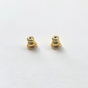 Polished 18K gold-plated brass earring backs with silicone core for secure fit