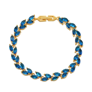 Elegant gold leaf bracelet featuring marquise-cut emerald green glass gems in a circular layout