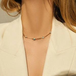 Collar bohemio chapado en oro de 18 quilates con dijes de ojo turco y cadena fina