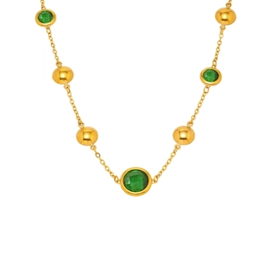 Golden necklace featuring geometric hollow circles and square green glass stones pendant
