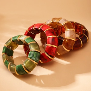 Set of four luxury 18k gold plated resin bangles with colorful marble patterns