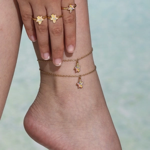 Golden unicorn jewelry set for kids including rings and anklets with rainbow enamel detail