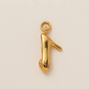 Detailed view of a 18K gold-plated high heel shoe pendant accessory with metal hanging loop