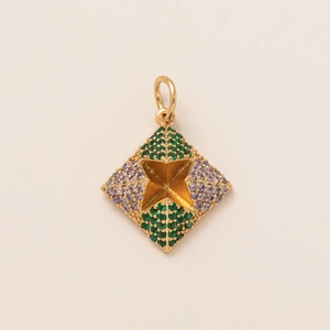 Detail of 18K gold star rhombus pendant featuring green and purple pavé crystal stones