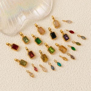 Polished gold stainless steel birthstone necklaces with assorted colorful crystal charms