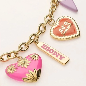 Pastel heart and Amour charm necklace in gold plated stainless steel with floral details