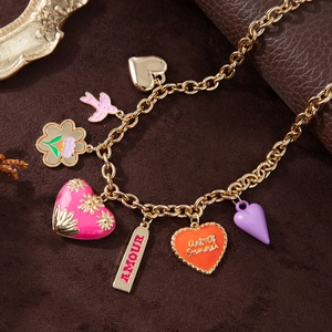 Golden necklace with colorful enamel heart charms, floral accents and summer word pendants