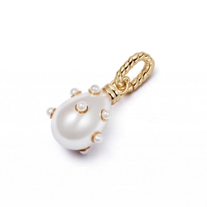 Detail of tear-drop pearl pendant with embossed miniature pearls and twisted gold clasp