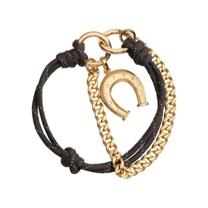 Elegant woven brown rope and gold Cuban chain bracelet with horseshoe pendant on white background
