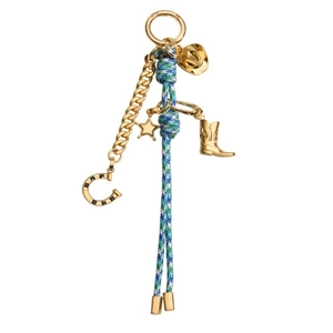 Detailed view of Western cowboy keychain with gold metal charms and braided rope