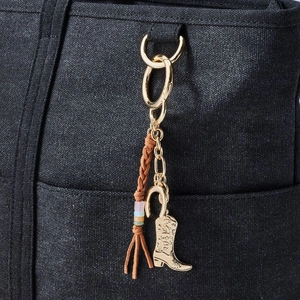 Western style 18K gold plated keychain with cowboy boot horseshoe and leather fringe