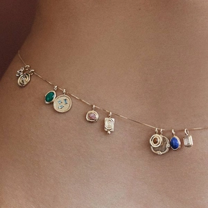 18K gold plated stainless steel necklace featuring multi-colored gemstone charms