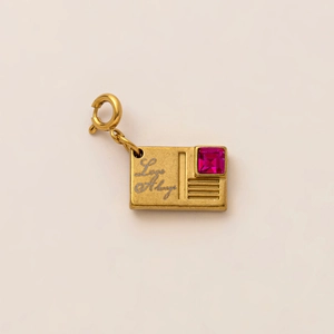Golden stamp-shaped pendant with Love Always engraving and rose red zircon detail