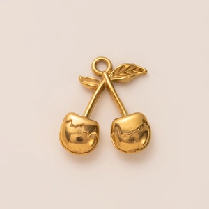 Detailed view of gold-plated mushroom pendant with artistic melted texture and dual leaves