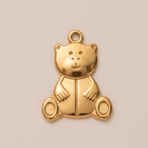 Detailed view of the 18K gold plated teddy bear pendant with polished finish and secure clasp